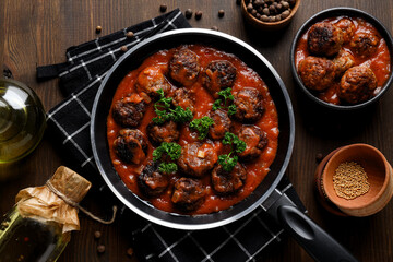Tasty meat food and homemade food concept - meatballs