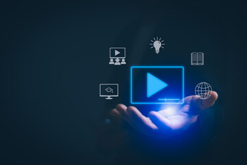 man's hand with a virtual screen Connect to  internet site to learn educational courses. Develop...