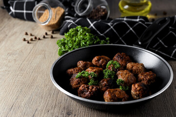 Tasty meat food and homemade food concept - meatballs