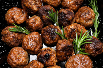 Tasty meat food and homemade food concept - meatballs