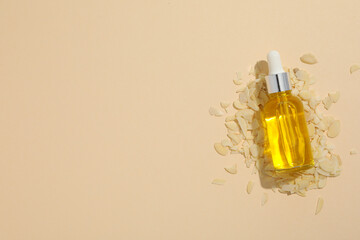 Skin care and body care concept - almonds, almond oil