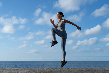 athletic brunette girl doing fitness doing exercises leading a healthy lifestyle