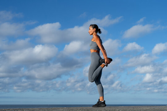 athletic brunette girl doing fitness doing exercises leading a healthy lifestyle
