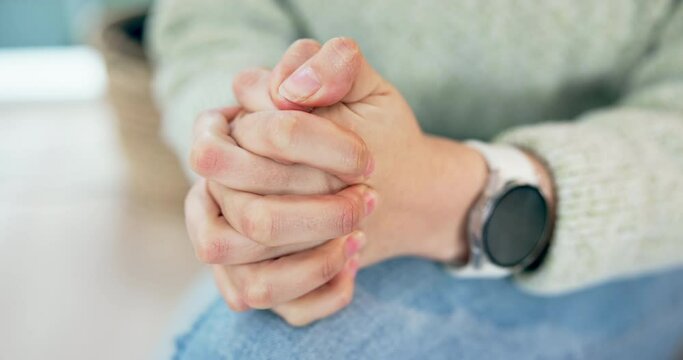 Hands, mental health and stress with a person closeup in a home feeling anxiety about a problem or issue. Psychology, depression or fear with an adult with pain, trauma and ptsd in a living room