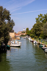 Fototapeta na wymiar 59th A typical Venetian canal situated in the grounds of the Giardnini garden in Venice