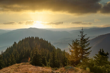 Naklejka na ściany i meble Scenic sunset in the Carpathian mountains.