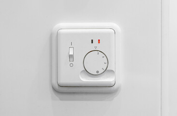 Close-up view of heating floor thermostat.