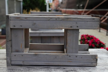 Wooden stool on a gray table