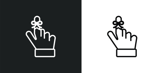 hand finger with a ribbon icon isolated in white and black colors. hand finger with a ribbon outline vector icon from human body parts collection for web, mobile apps and ui.