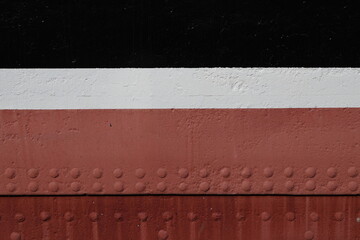Colorful stripes on the ship's side