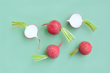 Fresh radish and sliced on green background, Organic vegetable