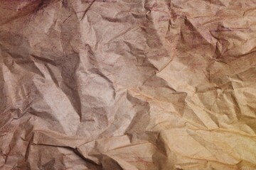 Obraz premium Texture of crumpled parchment paper as background, top view