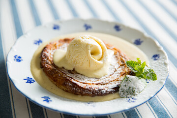 Apple pie ice cream on a plate. Top view.