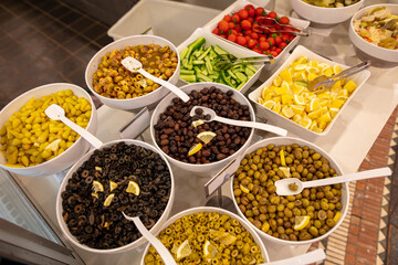 Pickled olives on display in a restaurant