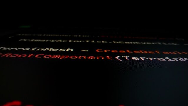 Closeup macro shot movement of coding script moving across LED screen with real-time AI-generated typing, showcasing advanced AI learning in optimization, debug and coding for software development.