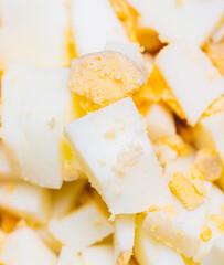 Sliced boiled eggs as a background.