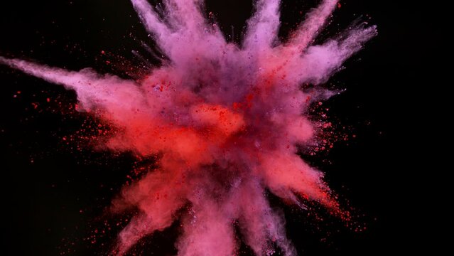 Super slow motion shot of color powder explosion isolated on black background. Filmed on high speed cinema camera at 1000fps