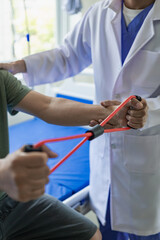 Physical therapy, rehabilitation, medical physiotherapy, male patients and treatment of injured sloths, osteoporosis and muscular inflammation rehabilitation.    Portrait Picture