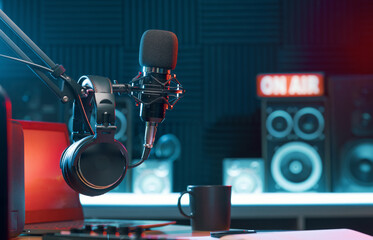 Headphones and mic at the radio station - obrazy, fototapety, plakaty