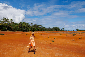 Girl hiking in desert area, Azores islands in Portugal.