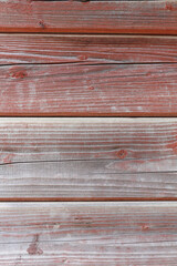 Red wooden texture of a natural tree. An aged hardwood wall background. - 642069135