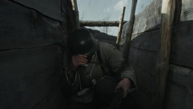Slow motion shot of Red Army soldier running along frontline trench and hiding from grenade explosion