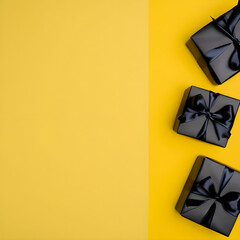 Yellow background with a black  gifts. Flat lay, copy space, Top view.