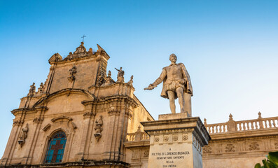 Fototapeta na wymiar Busacca statue and square in Scicli, Siciliy, Italy