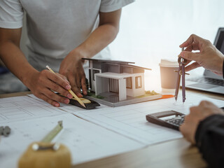 New Power House - Solar Energy, Meeting Engineer People at desk Solar Renewable Energy Planning and wind turbine technology new alternative energy development.