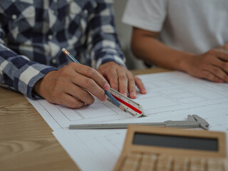 New Power House - Solar Energy, Meeting Engineer People at desk Solar Renewable Energy Planning and wind turbine technology new alternative energy development.