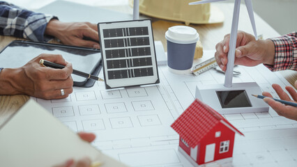 New Power House - Solar Energy, Meeting Engineer People at desk Solar Renewable Energy Planning and wind turbine technology new alternative energy development.