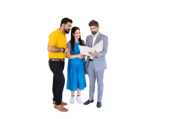 Real estate agent holding file meeting and discussing plan with happy young couple interested to buy house or property isolated over white background.