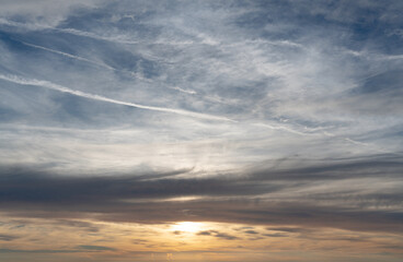 Gorgeous of the strong sunrise with silver lining and cloud on the orange sky