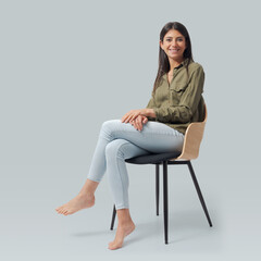 Beautiful woman sitting on a chair