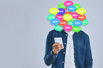 Social media, man and speech bubble with phone in studio, gray background and overlay with graphic,...