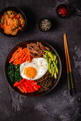 Traditional Korean dish Bibimbap: rice with vegetables beef and egg.