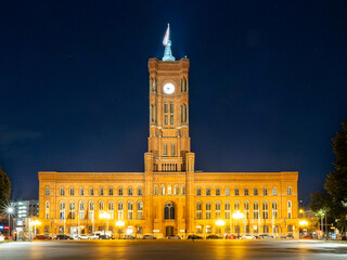 Fototapeta na wymiar City Hall in Berlin at night. The town hall is illuminated by night lights.