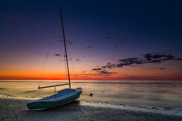 Sailboat at sunset, Cape Cod, Massachusetts.