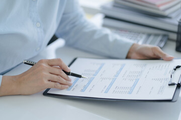 Small business accounting Businesswoman Accountant verify growing business with calculator. Accountancy