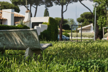 stone bench in the park in Italy