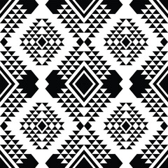 Navajo ethnic unique seamless repeat pattern. Black and white colors. Tribal abstract geometric art design for textile, fabric, curtain, rug, shirt, frame.