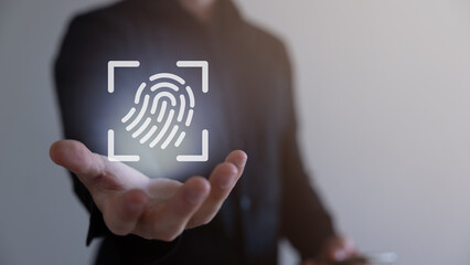 Touch screen, fingerprint scanner, biometric identity of a man's hand in a blurred background.