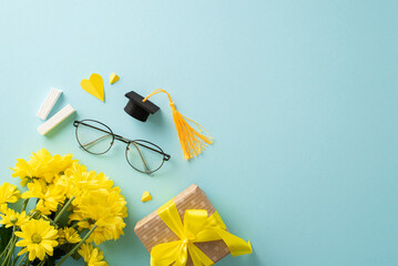 Assortment of elements including yellow chrysanthemums, present box, chalk, glasses, paper hearts,...