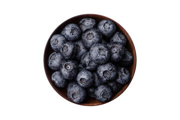 Delicious fresh sweet blueberries in a ceramic bowl. Vegan food