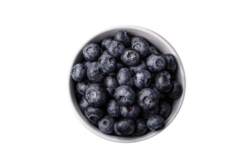 Delicious fresh sweet blueberries in a ceramic bowl. Vegan food