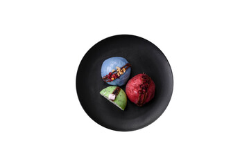 Delicious sweet colorful mochi desserts or ice cream with rice dough and toppings