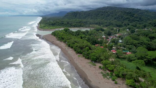 Beautiful aerial view of Dominical Beach and The Baru River in Costa Rica