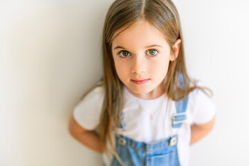cute girl portrait at home the little child look et camera