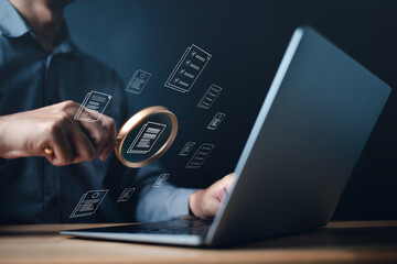 business, document, management, corporate, file, information, laptop, folder, professional, organization. close up to businessman, one hand typing keyboard, another hold magnifier to search document.