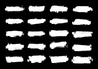 Collection of black brush strokes in black and white ink